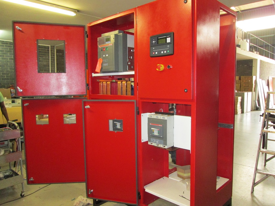 One of the products that Generex sells. A picture of a control panel in a bright red color.